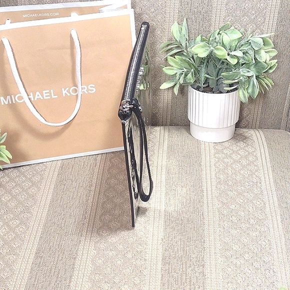 Michael Kors Jet Set Travel Wristlet Clutch in Foil Silver - Picture 6 of 16